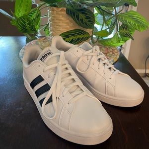 Adidas size 9 womens with black stripe